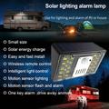Aurinkoenergialla toimiva LED-ulkovalaisin, jossa on turvahälytys N775 - 4 valaistusmoodia