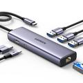 Ugreen CM512 7-in-1 USB-C-keskitin - 3x USB-A, 1x USB-C, 1x HDMI, 1x RJ45 - Harmaa