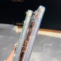 iPhone 16 Pro CrystalGlow Hybridikotelo sormuksen pidikkeellä - tähdet / läpinäkyvä